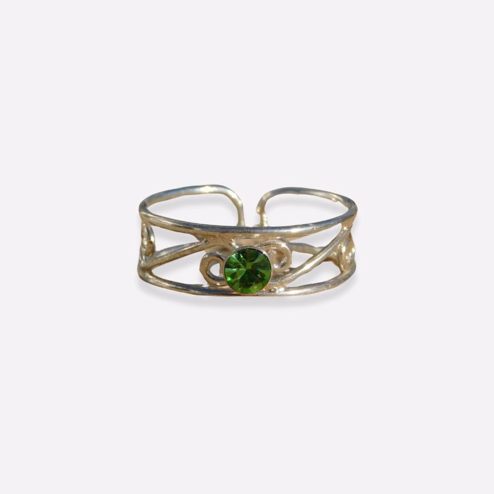anillo pie con piedra verde